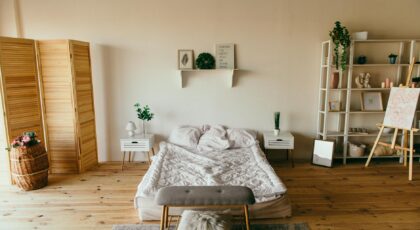 Elegant modern bedroom featuring wooden elements, soft lighting, and minimalist design. Perfect for interior inspiration.