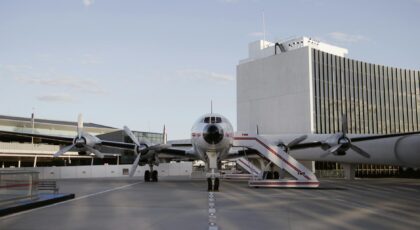 Historic aircraft parked at TWA Hotel showcasing classic aviation design in New York City.