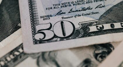 From above closeup of American dollar banknote with signature and printed words above paper money