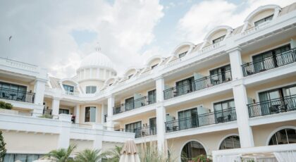 A classic resort facade under a bright sky, perfect for travel and vacation imagery.