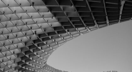 Captivating black and white view of the geometric structure of the Metropol Parasol in Seville, Spain.