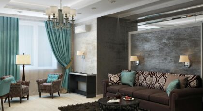Luxurious modern living room with chandelier, sofa, armchairs, and stylish decor.