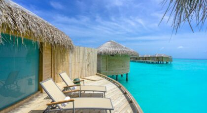 Stunning overwater villas with deck in Maldives, perfect for a relaxing tropical getaway.