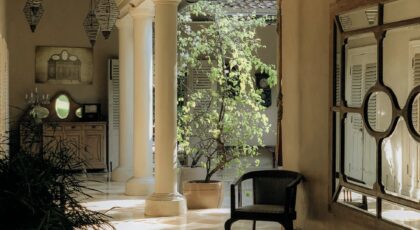 Luxurious hallway with classical columns and elegant design in a Bali villa.
