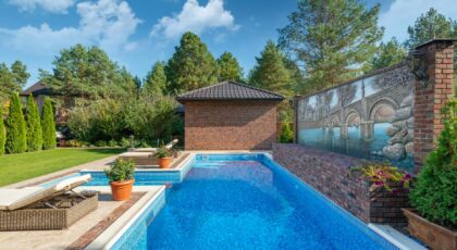 Brick house featuring a private swimming pool, garden, and mural painting for serene living.