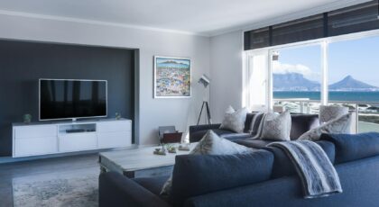 Stylish living room with a view of Table Mountain, blending modern design with natural beauty.