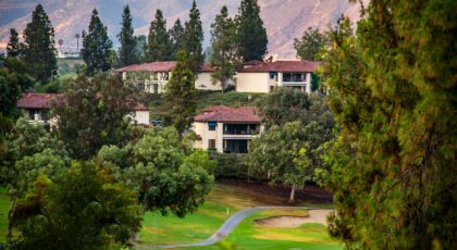 Charming villas surrounded by lush greenery & mountains in Escondido, California.