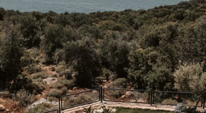 Enjoy a breathtaking view of the Mediterranean Sea from a luxurious infinity pool in Antalya, Turkey.
