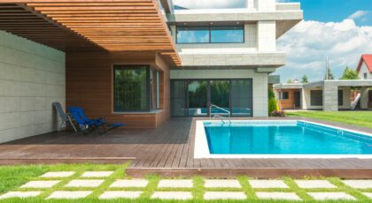 Contemporary villa featuring a swimming pool and elegant patio design, ideal for luxury living.