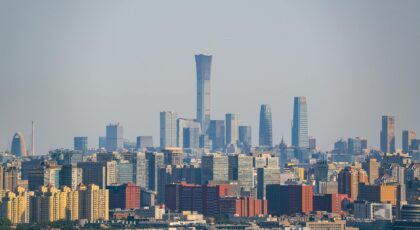 Aerial view of Beijing's skyline showcasing the Central Business District's skyscrapers on a clear day.