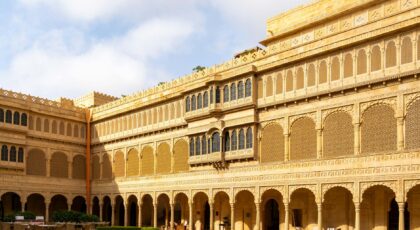A stunning view of Suryagarh Hotel's courtyard in Jaisalmer, showcasing traditional Rajasthan architecture.